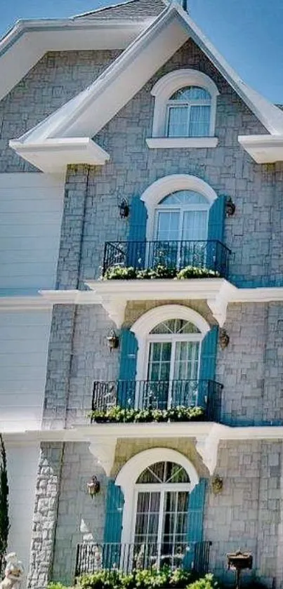 Classic stone house with blue accents in elegant design.