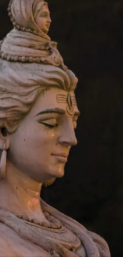 A serene stone sculpture evokes peace and divinity.