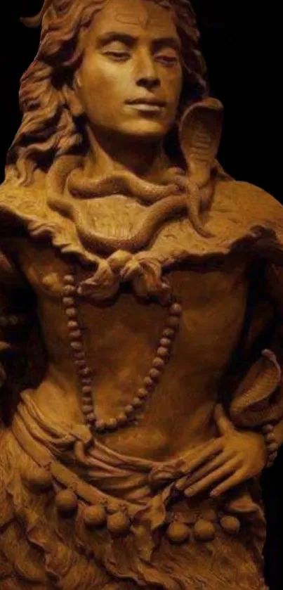 Elegant brown stone sculpture with detailed design on a dark background.