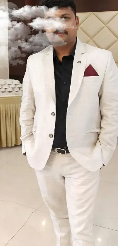 Person in elegant white suit with maroon pocket square against refined background.