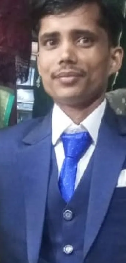 Man in a blue formal suit portrait