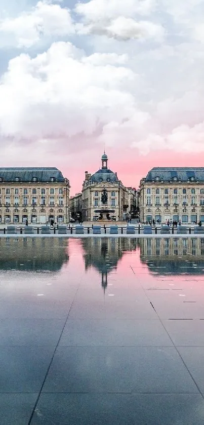 Elegant historical architecture reflected at sunset in tranquil setting.