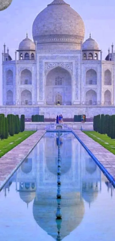 Taj Mahal reflected in serene water body, vibrant mobile wallpaper.