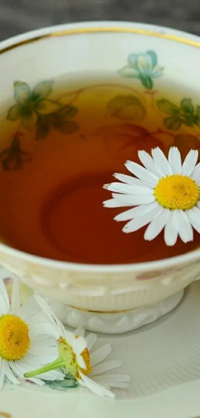 Elegant tea cup with daisies floating inside.