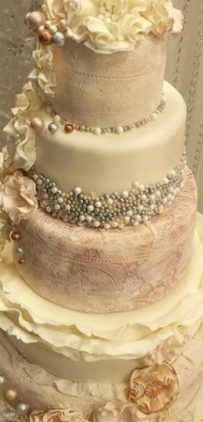 Elegant ivory wedding cake with pearl and floral decorations.