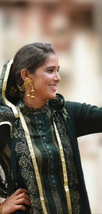 Elegant woman in traditional attire with intricate patterns.