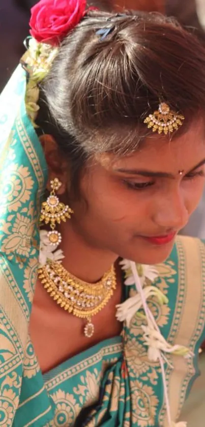 Woman in traditional attire with gold jewelry, elegant and cultural.