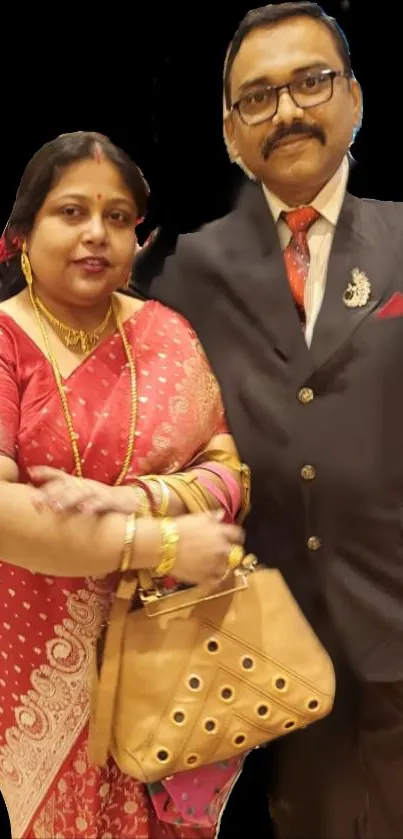 Traditional couple in vibrant attire on a stylish mobile wallpaper.