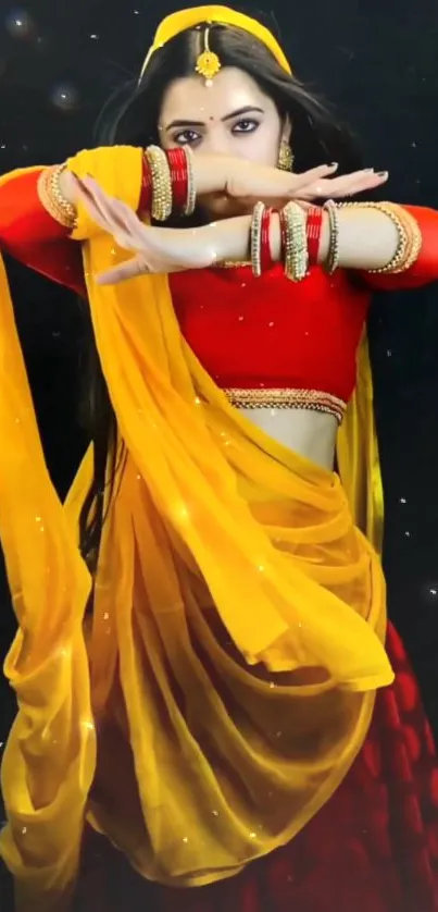 Traditional dance attire in red and yellow, showcasing cultural elegance.