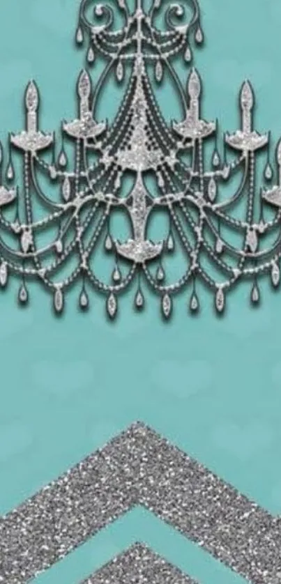 Turquoise wallpaper with a silver chandelier and chevron glitter design.