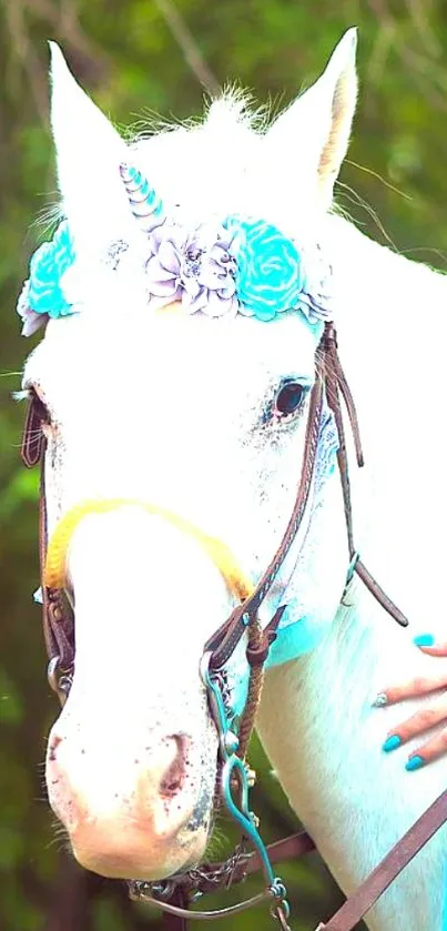 White unicorn with floral mane on green background.