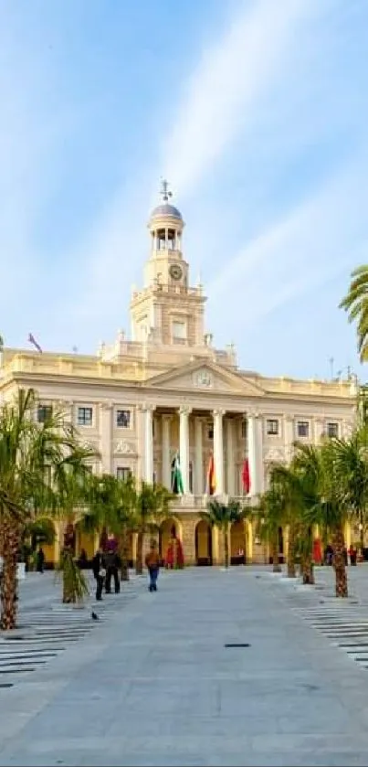 Elegant city scene with palm trees and classic architecture under a blue sky.