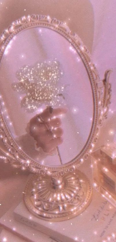 Vintage mirror reflecting a hand with a sparkling flower in soft pink aesthetic.