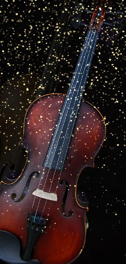 A beautiful violin with golden glitter on a black background wallpaper.