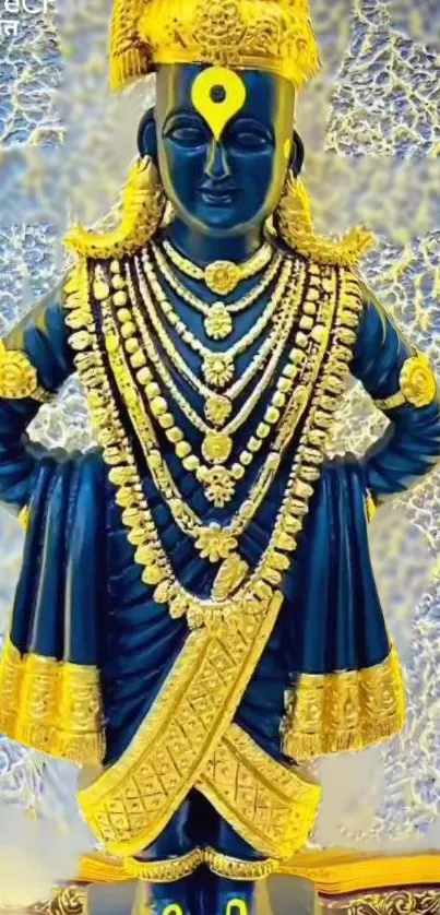 Tat.ion of Lord Vithoba statue in gold and blue millwaSadia background.