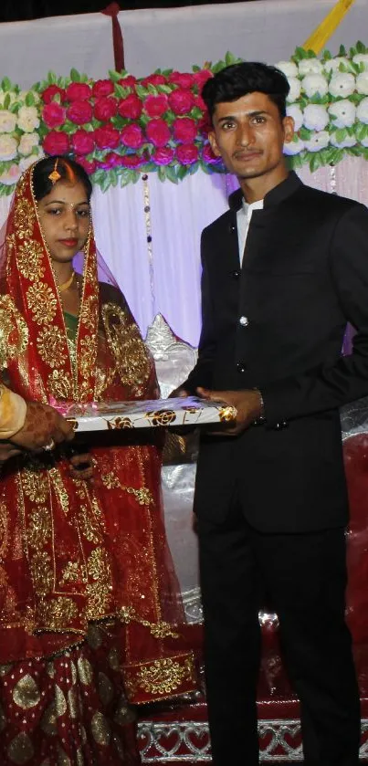 Group celebrating a traditional wedding with vibrant decor.