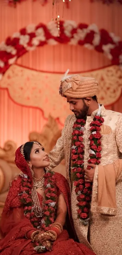 A couple in traditional attire celebrating their wedding with vibrant decor.