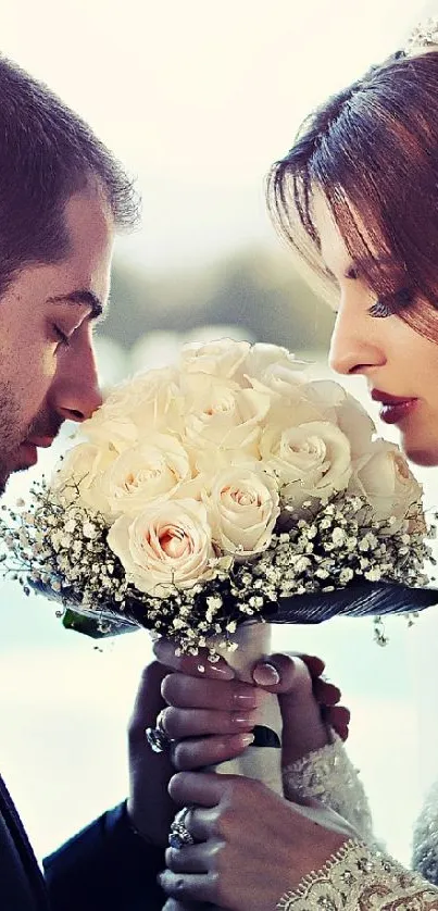 Elegant bride and groom with bouquet in romantic wedding pose.