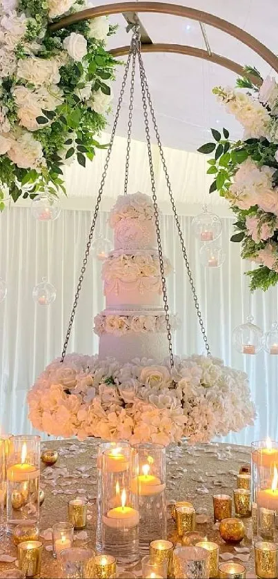 White wedding centerpiece with flowers and candles in a soft elegant setting.