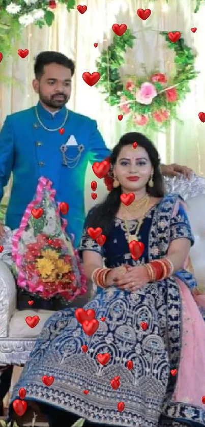 Elegant wedding stage with couple and floral decor.