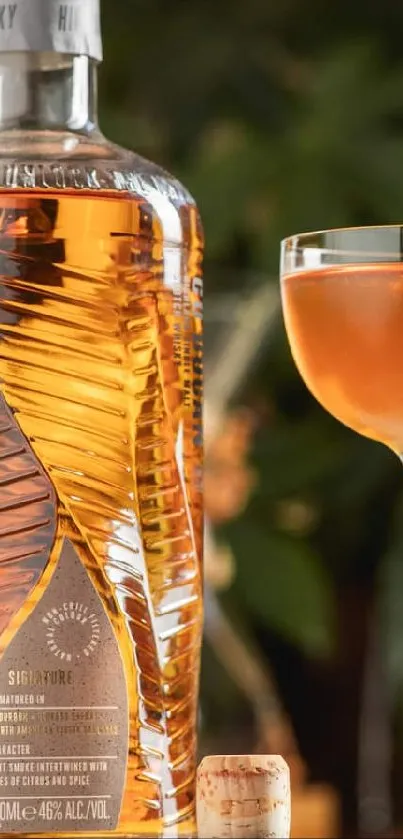 Elegant whiskey bottle and cocktail glass set on a cozy background.