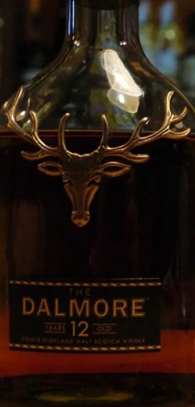 Elegant whisky bottle with golden stag emblem, set against a rich dark brown background.