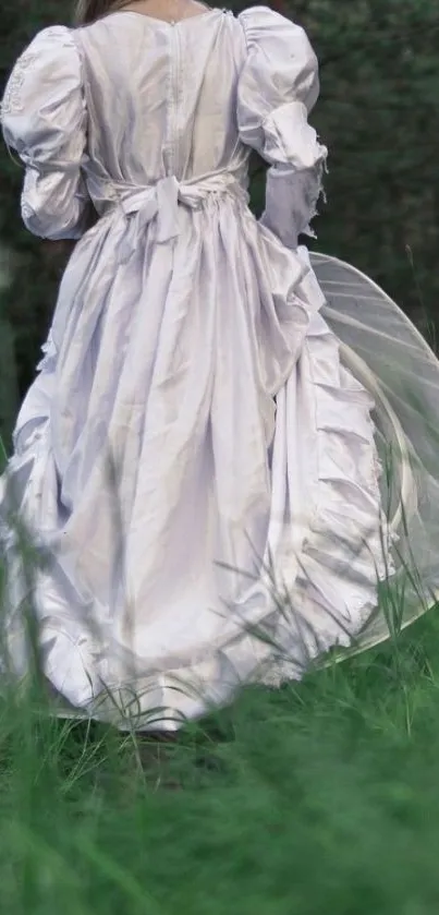 A woman in a flowing white dress walks through a green forest.