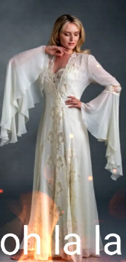 Elegant white dress on a woman with lace detail and flowing sleeves.