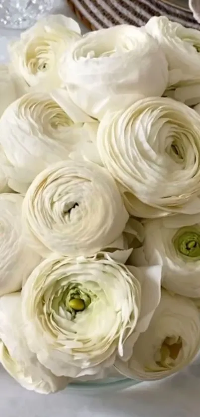 Elegant white flowers in a bowl.