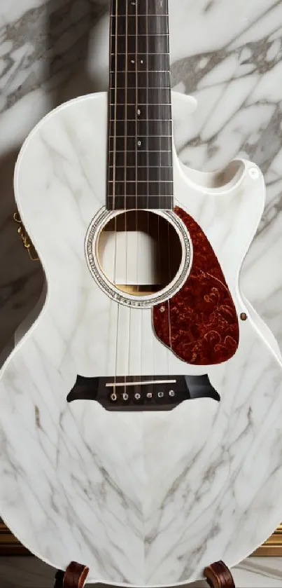 Elegant white guitar with marble background.