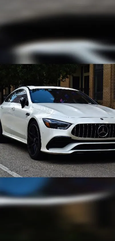 White luxury car on city street mobile wallpaper.