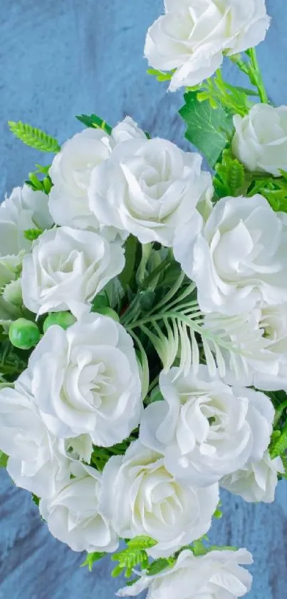 White roses bouquet on a blue textured background.