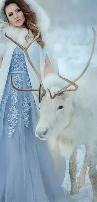 Woman in blue dress with white reindeer in snowy landscape.