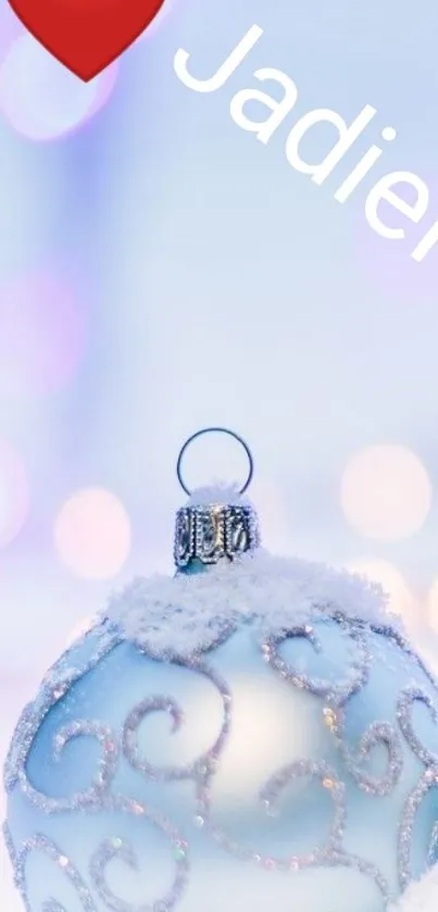 Snow-covered ornament with bokeh lights