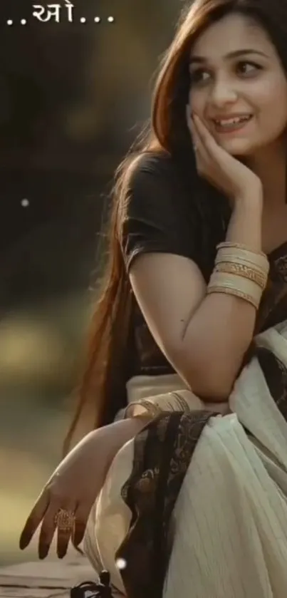 Woman in elegant saree with a soft, brown-toned background.