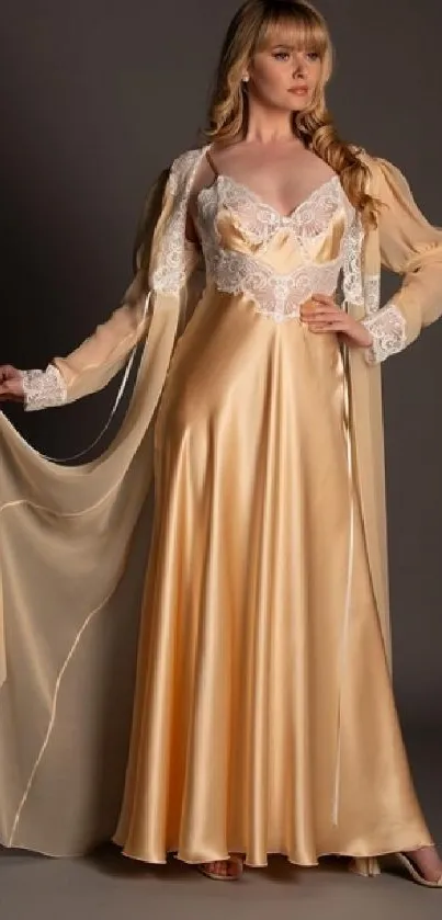 Woman in a flowing champagne satin gown with lace detailing.