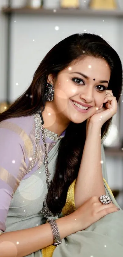 Elegant woman in traditional saree smiling gracefully.