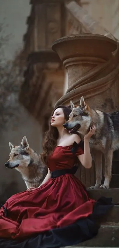 Woman in a red dress with two wolves on a stone staircase.