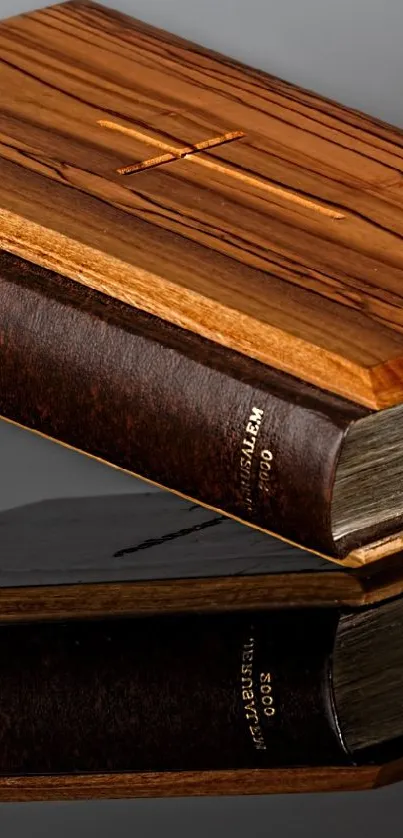 Elegant wooden Bible on reflective surface, dark background.