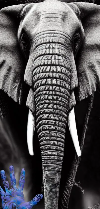 Elephant grayscale art with a mystical blue hand in the foreground.