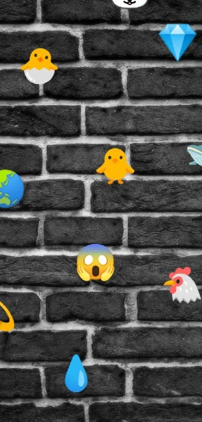 Playful emoji artwork on a black brick wall.