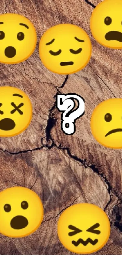 Six expressive emojis on rustic wood background.