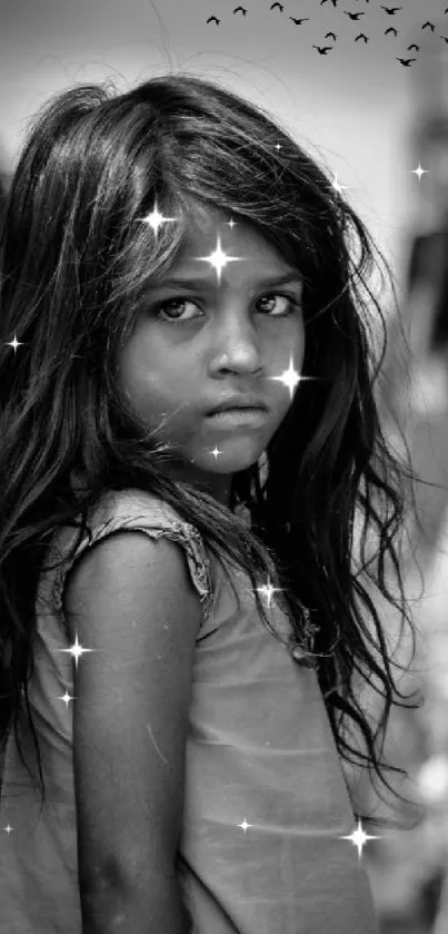 Black and white portrait of a child in an urban setting.