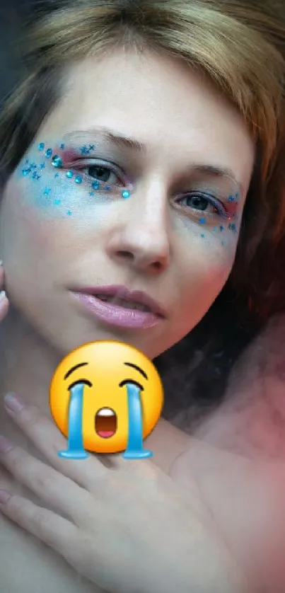 Portrait mobile wallpaper with colorful mist and an expressive emoji overlay.