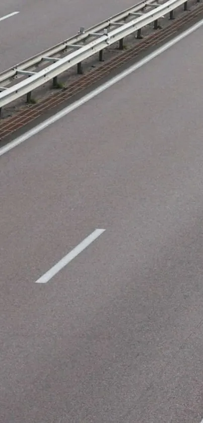 An empty highway with clear, gray lanes