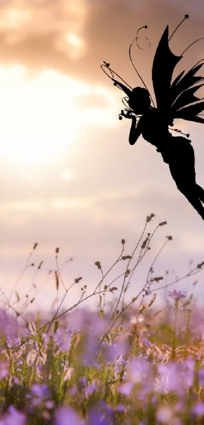 Silhouette of a fairy at sunrise with wildflowers.