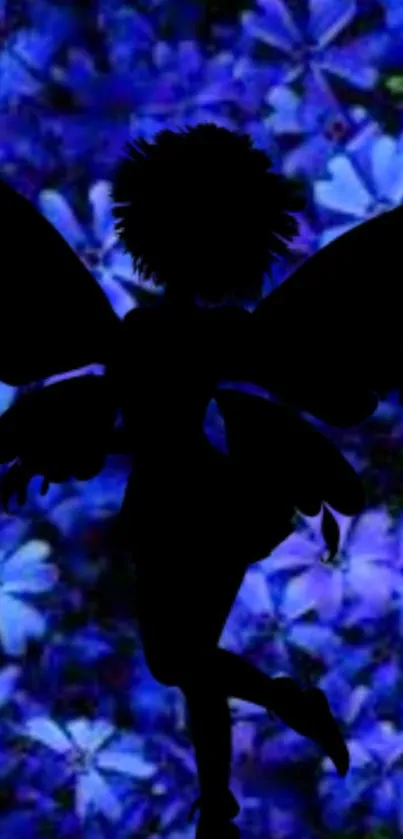 Fairy silhouette on blue floral background wallpaper.