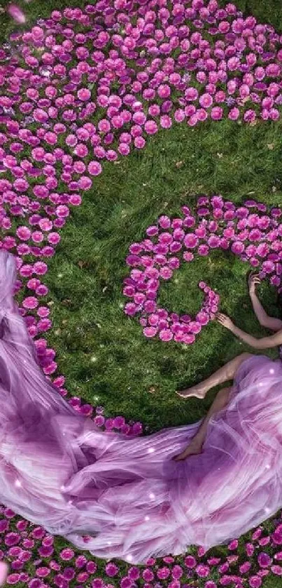 Enchanting pink floral spiral on lush green grass.