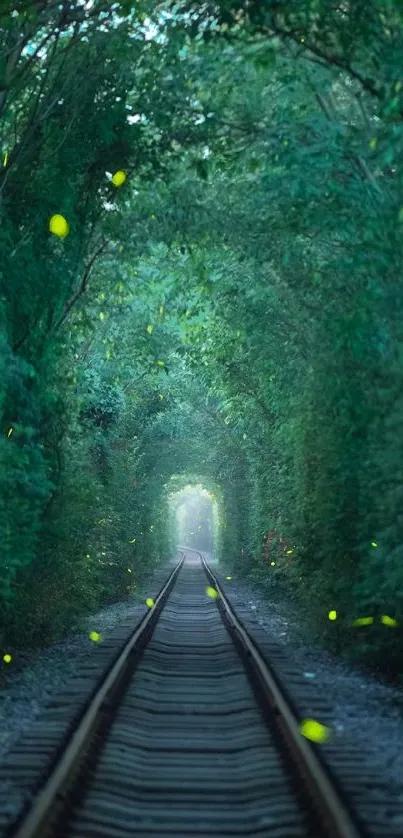 Enchanted green railway path in forest with glowing orbs.