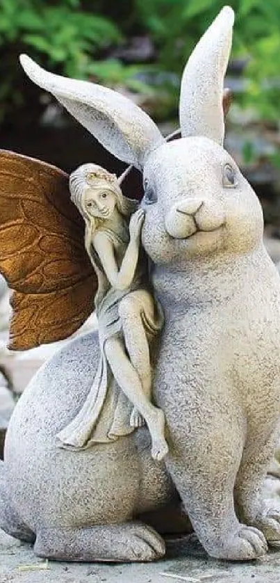 Whimsical rabbit with fairy in garden decor.